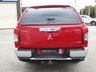 USED 2020 70 MITSUBISHI L200 2.3 DI-D WARRIOR DCB 148 BHP Finished in VOLCANIC RED MET with contrasting GREY Cloth Interior. This pick up is as rough and as tough as they come with great safety credentials and a four star rating from Euro NCAP. This is a great Used Pick Up Truck. Features include, Truckman Top, DAB Radio, B/Tooth, Cruise Control, Front Fogs, Sat Nav Rear View Camera and much more. Serviced at 13297 miles, 39761 miles 53028 miles and on arrival at 70234 miles.