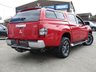 USED 2020 70 MITSUBISHI L200 2.3 DI-D WARRIOR DCB 148 BHP Finished in VOLCANIC RED MET with contrasting GREY Cloth Interior. This pick up is as rough and as tough as they come with great safety credentials and a four star rating from Euro NCAP. This is a great Used Pick Up Truck. Features include, Truckman Top, DAB Radio, B/Tooth, Cruise Control, Front Fogs, Sat Nav Rear View Camera and much more. Serviced at 13297 miles, 39761 miles 53028 miles and on arrival at 70234 miles.