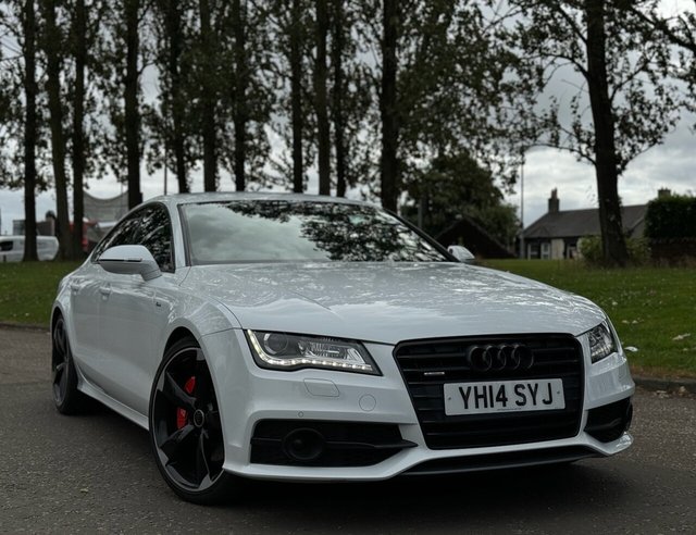 2014 14 AUDI A7 3.0 TDI QUATTRO BLACK EDITION 5d 313 BHP OVER &pound;10500 worth of extras +  Advanced Technology pack +  Night vision assistant with pedestrian detection +  Head-up display +  Advanced key +  Deluxe 4-zone automatic climate control +  Audi parking system advanced (rear view camera) +  Mobile telephone preparation - High +  Ambient lighting +  Deluxe 4-zone automatic climate control +