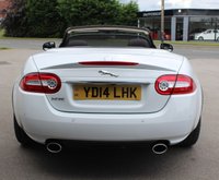 PRE-OWNED 2014 14 JAGUAR XK 5.0 PORTFOLIO 2d 380 BHP Polaris White, Full Black Leather Interior, 20" Orona Alloys (&pound;1025 option), Piano Black Veneer, 3 Spoke Heated Sports Steering Wheel (&pound;500 option), Bowers & Wilkins Audio System, Parking Camera, Electric Folding Mirrors, Heated and Cooled Seats, Heated Front Screen, Wind Deflector, Auto Headlights, Satellite Navigation, Bluetooth Phone, System, DAB Radio, Cruise Control, Keyless Entry, Suede Headlining, LED Taillights, LED Running Lights With Xenon Headlights, Rain Sensing Wipers, 16 Way Electr