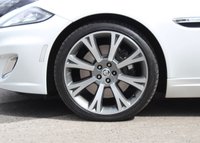 PRE-OWNED 2014 14 JAGUAR XK 5.0 PORTFOLIO 2d 380 BHP Polaris White, Full Black Leather Interior, 20" Orona Alloys (&pound;1025 option), Piano Black Veneer, 3 Spoke Heated Sports Steering Wheel (&pound;500 option), Bowers & Wilkins Audio System, Parking Camera, Electric Folding Mirrors, Heated and Cooled Seats, Heated Front Screen, Wind Deflector, Auto Headlights, Satellite Navigation, Bluetooth Phone, System, DAB Radio, Cruise Control, Keyless Entry, Suede Headlining, LED Taillights, LED Running Lights With Xenon Headlights, Rain Sensing Wipers, 16 Way Electr