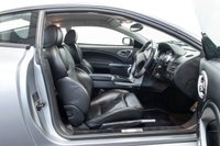USED 2004 54 ASTON MARTIN VANQUISH 5.9 V12 2d 460 BHP 2004, V12 Vanquish Two plus zero with comprehensive History file, 19" Alloys, Rear parking sensors, Heated front windscreen, Powerfold door mirrors. Electric Heated front seats