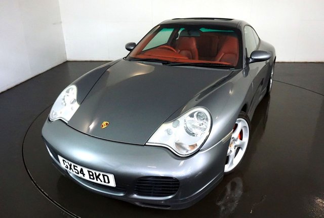2004 54 Porsche 911 996 3.6 CARRERA  4S 2d 316 BHP-2 FORMER KEEPERS-FINISHED IN SEAL GREY METALLIC-BOXSTER RED LEATHER UPHOLSTERY-SLIDE & TILT GLASS SUNROOF-REAR WIPER-BOSE SOUND PACKAGE-HEATED SEATS-ELECTRIC SEATS-IMS BEARING DONE IN 2019-SPECIAL CAR WITH THE RIGHT GEARBOX