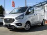 USED 2020 70 FORD TRANSIT CUSTOM 2.0 300 LIMITED P/V ECOBLUE 129 BHP Finished in SILVER METALLIC with contrasting CLOTH trim. This Transit is a great drivers van. It has long been the icon of the british roads. This van offers great value, practical, economical and is versitile. Features include DAB Radio, B/Tooth, Apple Play, Heated Seats, Park sensors, Ply Lined, Cruise Control, Alloys, 2 Keys and much more. This very clean van has been Serviced at 32000 miles, 61360 miles and on arrival at 73461 miles.