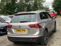 USED 2016 66 VOLKSWAGEN TIGUAN 2.0 SE TDI BMT 5d 148 BHP THIS CAR COMES WITH 6 MONTHS WARRANTY , BREAKDOWN COVER & RECOVERY++   Front and rear parking aid +  Adaptive cruise control +  Dual zone climate control +  Traction control +  Lane assist +  Assistance Graphic +  Driver attention alert +  Tyre pressure monitors +  Proactive passenger protection +  Auto start/stop +  Auto side mirrors +  Heated side mirrors +  Rain sensing +  Bluetooth +  Dab Radio +  Trip computer +  Auto headlights +  Bending Lights +  2 front cupholders +  Central locking +