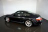 USED 2002 02 PORSCHE 911 996 CARRERA 4S 3.6 TIPTRONIC 2d 316 BHP-Very Nice low mileage example finished in Basalt black metallic with Black leather upholstery-Only 2 Former keepers-Last Keeper since 2015-Supplied new by Lindbrook Porsche, Official Porsche Centre for Kent-13 Service Stamps in the Original Service book-7 OPC & 6 Specialist-3 Keys-Bose Sound-Climate control-Satnav-Electric Sunroof-Rear wiper-Rear parking Assistance-Cd changer-Litronic Headlights with Cleaning system-Sports Exhaust-Leather Roof Lining-Stainless Steel Entrance panels with model Typeface-The One to Have. 