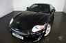 USED 2010 60 JAGUAR XK 5.0 XK PORTFOLIO 2d 385 BHP-2 FORMER KEEPERS-FINISHED IN EBONY BLACK WITH HEATED BLACK LEATHER UPHOLSTERY-SUPERB LOW MILEAGE EXAMPLE-DUAL CLIMATE CONTROL-CRUISE CONTROL-MFSW-BLUETOOTH-SATNAV 