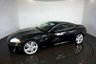 USED 2010 60 JAGUAR XK 5.0 XK PORTFOLIO 2d 385 BHP-2 FORMER KEEPERS-FINISHED IN EBONY BLACK WITH HEATED BLACK LEATHER UPHOLSTERY-SUPERB LOW MILEAGE EXAMPLE-DUAL CLIMATE CONTROL-CRUISE CONTROL-MFSW-BLUETOOTH-SATNAV 