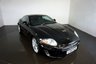 USED 2010 60 JAGUAR XK 5.0 XK PORTFOLIO 2d 385 BHP-2 FORMER KEEPERS-FINISHED IN EBONY BLACK WITH HEATED BLACK LEATHER UPHOLSTERY-SUPERB LOW MILEAGE EXAMPLE-DUAL CLIMATE CONTROL-CRUISE CONTROL-MFSW-BLUETOOTH-SATNAV 