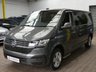 USED 2020 70 VOLKSWAGEN TRANSPORTER SHUTTLE 2.0 SHUTTLE SE TDI 5d 148 BHP LWB 8 SEATS SAT NAV REAR VIEW CAMERA CRUISE OCNTROL PARKING SENSORS AUTO FOLDING SIDE STEPS 1 OWNER EXCELLENT SERVICE HISTORY GENUINE LOW MILEAGE