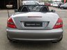 USED 2010 10 MERCEDES-BENZ SLK 1.8 SLK200 KOMPRESSOR 2d 184 BHP Finished in PALLADIUM SILVER with Black Sports HEATED LEATHER TRIM. This SLK is a luxury two-seater roadster. This great looking head turner is stylish and offers impressive refinement thanks to its folding hard-top. Features include Heated Leather, Airscarf (Neck level heating), Sports Pack, Red Calipers, B/Tooth, Cruise, 18" Alloys and more. Dealer serviced at 8908 miles, 12391 miles, 15496 miles, 19125 miles, 31706 miles, 41337 miles and at 63369 miles