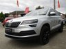 USED 2020 70 SKODA KAROQ 1.0 SE L TSI 5d 114 BHP Finished in BRILLIANT SILVER with Heated LEATHER ALCANTARA Trim. This Karoq is a very good family SUV, offering comfort and practicality at a very competitive price. It is a top-drawer family SUV, perfectly mixing an impressive interior, good driving characteristics and a comfortable ride with clever seating options, a big boot and plenty of space for passengers. Features include Sat Nav,Rear Camera, DAB radio, Apple Play, Park Sensors, Cruise control, Heated seats, Keyless Start and much more.