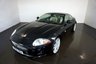 USED 2006 06 JAGUAR XK 4.2 V8 Coupe 2dr Petrol Auto Euro 4 (300 ps)-Fantastic low mileage example-Finished in Midnight black with heated ivory leather upholstery-20 inch unmarked alloy wheels-electric memory seats-dual climate control-cruise control-Mfsw-Satnav-This car represent fantastic value for money 