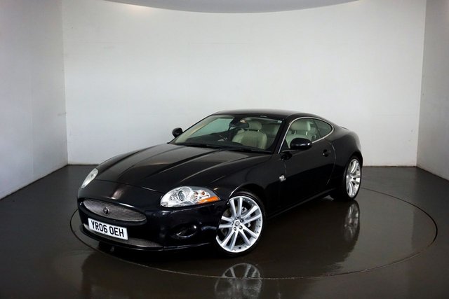 2006 06 Jaguar Xk 4.2 V8 Coupe 2dr Petrol Auto Euro 4 (300 ps)-Fantastic low mileage example-Finished in Midnight black with heated ivory leather upholstery-20 inch unmarked alloy wheels-electric memory seats-dual climate control-cruise control-Mfsw-Satnav-This car represent fantastic value for money