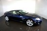 USED 2014 14 JAGUAR XK 5.0 V8 Signature Coupe 2dr Petrol Auto Euro 5 (385 ps)-Superb low mileage example-Finished in Dark Sapphire Metallic-Heated Soft Grain Ivory Leather Upholstery-20 inch alloy wheels-dual climate control-cruise control-Mfsw-Satnav-Dab radio-Bluetooth-Electric memory seats-Reverse camera-Bowers & Wilkins Sound System-Traditional Colour combination. 