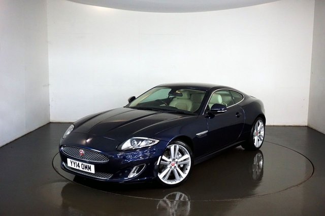 2014 14 Jaguar Xk 5.0 V8 Signature Coupe 2dr Petrol Auto Euro 5 (385 ps)-Superb low mileage example-Finished in Dark Sapphire Metallic-Heated Soft Grain Ivory Leather Upholstery-20 inch alloy wheels-dual climate control-cruise control-Mfsw-Satnav-Dab radio-Bluetooth-Electric memory seats-Reverse camera-Bowers & Wilkins Sound System-Traditional Colour combination.