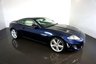 USED 2014 14 JAGUAR XK 5.0 V8 Signature Coupe 2dr Petrol Auto Euro 5 (385 ps)-Superb low mileage example-Finished in Dark Sapphire Metallic-Heated Soft Grain Ivory Leather Upholstery-20 inch alloy wheels-dual climate control-cruise control-Mfsw-Satnav-Dab radio-Bluetooth-Electric memory seats-Reverse camera-Bowers & Wilkins Sound System-Traditional Colour combination. 