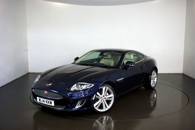 2014 14 Jaguar Xk 5.0 V8 Signature Coupe 2dr Petrol Auto Euro 5 (385 ps)-Superb low mileage example-Finished in Dark Sapphire Metallic-Heated Soft Grain Ivory Leather Upholstery-20 inch alloy wheels-dual climate control-cruise control-Mfsw-Satnav-Dab radio-Bluetooth-Electric memory seats-Reverse camera-Bowers & Wilkins Sound System-Traditional Colour combination.