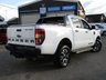USED 2021 21 FORD RANGER 2.0 EcoBlue Wildtrak Pickup Double Cab 4dr Diesel Auto 4WD Euro 6 (s/s) (213 ps) Finished in FROZEN WHITE with FULL HEATED LEATHER TRIM. This one of the best selling Pick Ups on the market today. Take a look at this today and you will see why so many drivers would love to own a Ford Ranger. Features include Side Steps, Heated Leather, Sat Nav, DAB Radio, Rear Camera, Rear Electric Load Cover, Alloys, B/Tooth and much more. Dealer serviced at 10634 miles, 21365 miles, 35046 miles, 46602 miles, and at 77807 miles on 26/4/2024.