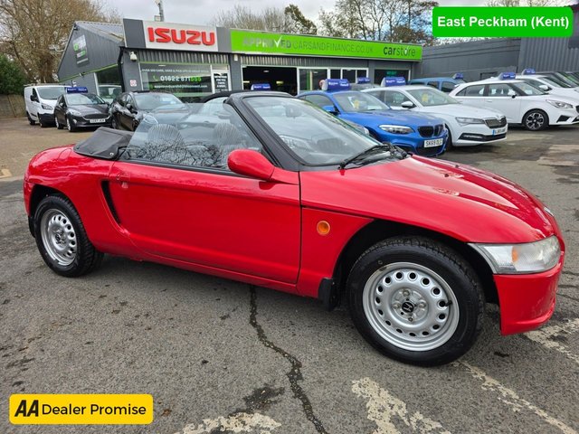 View our Honda Beat Beat in red with CLASSIC CAR 111,000 miles, service history. Features 5-speed manual gearbox, manual convertible roof, and more! A stunning classic car!