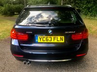 USED 2013 63 BMW 3 SERIES 3.0 330d Luxury Touring 5dr Diesel Auto xDrive Euro 5 (s/s) (258 ps) 4X4 X-DRIVE // PANORAMIC ROOF // HIGH BEAM ASSIST//ELEC TAIL GATE//HEATED FULL CREAM HEATED LEATHER SEATING//LIT DOOR HANDLES//PADDLE SHIFT//FULL BMW/SPECIALIST SERVICE HISTORY//BLUETOOTH//PARK SENSORS//4X4//STUNNING CAR//NEW STOPSTART BATTERY RECENTLY FITTED//ELEC FOLD DOOR MIRRORS// Auto xDrive 4X4  (s/s) 258 BHP//PANORAMIC ROOF//HIGH BEAM ASSIST//ELECTRIC TAIL GATE // HEATED FULL CREAM LEATHER SEATING//LIT DOOR HANDLES//PADDLE SHFT//FULL BMW SERVICE HISTORY//BLUETOOTH//PARK SENSORS//4X4//STUNNING CAR