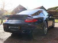 USED 2010 10 PORSCHE 911 3.8 997 Turbo Coupe 2dr Petrol PDK AWD (268 g/km, 500 bhp) FULL PORSCHE HISTORY WITH PORSCHE WARRANTY - SUNROOF - HEATED MEMORY SEATS - PASM - NAVIGATION - CENTERLOCK WHEELS - CARBON INTERIOR - BOSE STEREO