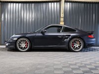 USED 2010 10 PORSCHE 911 3.8 997 Turbo Coupe 2dr Petrol PDK AWD (268 g/km, 500 bhp) FULL PORSCHE HISTORY WITH PORSCHE WARRANTY - SUNROOF - HEATED MEMORY SEATS - PASM - NAVIGATION - CENTERLOCK WHEELS - CARBON INTERIOR - BOSE STEREO