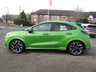 USED 2021 21 FORD PUMA 1.5T EcoBoost ST SUV 5dr Petrol Manual Euro 6 (s/s) (200 ps) Finished in MEAN GREEN METALLIC with HEATED RECARO ALCANTARA Trim. This Ford Puma certainly looks the part, it is the sportiest version of the Puma compact SUV, with meaner looks and a racier setup, It's got the raised up driving position, the eye-catching design, and a miniature SUV shape. Features include Nav with Virtual Dash, DAB, B&O Speakers, Heated Steering Wheel, Red Calipers, Auto Park, Rear Camera, B/Tooth, Low Mileage and more.  Dealer serviced at 11394 miles and 18545 miles