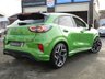 USED 2021 21 FORD PUMA 1.5T EcoBoost ST SUV 5dr Petrol Manual Euro 6 (s/s) (200 ps) Finished in MEAN GREEN METALLIC with HEATED RECARO ALCANTARA Trim. This Ford Puma certainly looks the part, it is the sportiest version of the Puma compact SUV, with meaner looks and a racier setup, It's got the raised up driving position, the eye-catching design, and a miniature SUV shape. Features include Nav with Virtual Dash, DAB, B&O Speakers, Heated Steering Wheel, Red Calipers, Auto Park, Rear Camera, B/Tooth, Low Mileage and more.  Dealer serviced at 11394 miles and 18545 miles