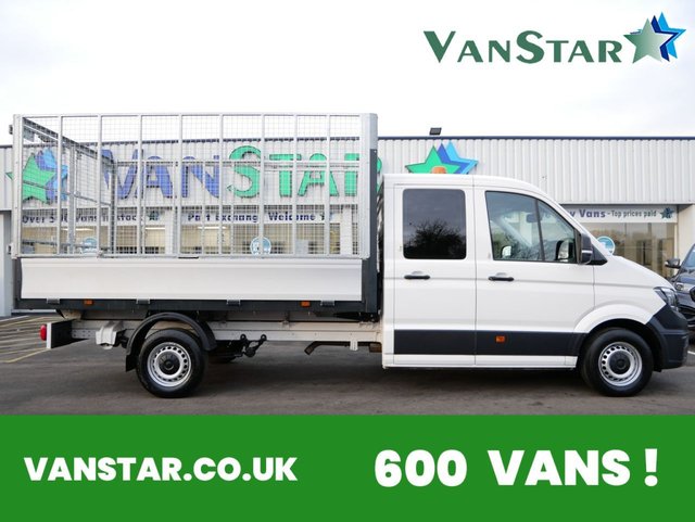 View our Volkswagen Crafter CR35 2.0 TDI 140 ETG CAGED UTILITY CAB DROPSIDE ( SAT NAV / AIR CON )