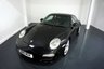 USED 2010 10 PORSCHE 911 3.6 997 Carrera Coupe 2dr Petrol PDK (230 g/km, 345 bhp)-Factory extras worth &pound;5,366-Superb Low Mileage Example-Finished in Basalt Black with Heated Black Leather Upholstery-Climate Control-Cruise Control-Mfsw-Bluetooth-Satnav-3 Former Keepers-19 Inch Carrera Classic Alloy Wheels-Rear Park Assist-Porsche Active Suspension Management =PASM.Great Value and Specification. 