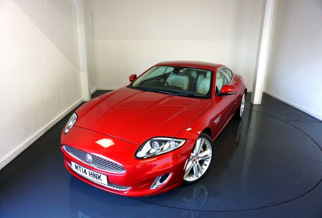 2014 14 Jaguar Xk 5.0 V8 Signature Coupe 2dr Petrol Auto Euro 5 (385 ps)JAGUAR XK 5.0 V8 Signature Coupe 2dr Petrol Auto Euro 5 (385 ps)-Superb Example Finished in Italian Racing Red With Heated Ivory Leather Upholstery-Dual Climate Control-Cruise Control-Mfsw-Satnav-Bluetooth-Auto Headlights-20 Inch 5 Spoke Alloy Wheels-Has To Be The Best Colour Combination.