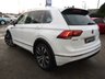 USED 2016 66 VOLKSWAGEN TIGUAN 2.0 TDI BlueMotion Tech R-Line SUV 5dr Diesel DSG 4Motion Euro 6 (s/s) (190 ps) Finished in PURE WHITE with contrasting Alcantara trim. This high spec Tiguan has a more sophisticated look to add to its high quality interior and high spec. This Tiguan is spacious, comfortable and great to drive, while its raised driving position gives you a great view. Features include, Pan Roof, Nav, Virtual Dash, DAB, B/Tooth, 20" Alloys, Park Sensors and more. Comes Fully serviced and with 2 Keys.