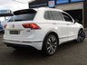 USED 2016 66 VOLKSWAGEN TIGUAN 2.0 TDI BlueMotion Tech R-Line SUV 5dr Diesel DSG 4Motion Euro 6 (s/s) (190 ps) Finished in PURE WHITE with contrasting Alcantara trim. This high spec Tiguan has a more sophisticated look to add to its high quality interior and high spec. This Tiguan is spacious, comfortable and great to drive, while its raised driving position gives you a great view. Features include, Pan Roof, Nav, Virtual Dash, DAB, B/Tooth, 20" Alloys, Park Sensors and more. Comes Fully serviced and with 2 Keys.