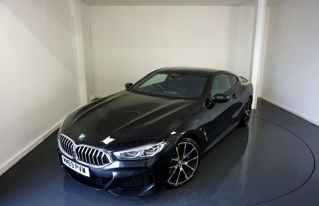 2019 69 BMW 8 Series 3.0 840i Coupe 2dr Petrol Steptronic Euro 6 (s/s) (340 ps)-Factory Extras Worth &pound;5,630-2 Owner Car From New-Finished in Black Sapphire Metallic with Heated Black Extended Merino Leather Upholstery-Bmw Individual Piano Black Interior Trim-Privacy Glass-M Seat Belts-Technology Package-Premium Package-Dual Climate Control-Mfsw-Cruise Control-Dab Radio-Bluetooth-Satnav-Auto Headlights-20 Inch Alloy Wheels-Superb Looking 8 Series.