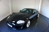 USED 2011 61 JAGUAR XK 5.0 V8 Coupe 2dr Petrol Auto Euro 5 (385 ps)-XK E-Type 50th Anniversary Edition (2011)-Commissioned by Jaguar Italy, the Italian dealer of Jaguar Cars, the XK E-Type Anniversary Edition was a limited production variant of the XK built to commemorate the 50th anniversary of the E-Type. Unveiled in 2011, the car features special Black Cherry Colour along with a black bonnet and 19-inch Tamana heritage alloy wheels with red Jaguar badging. Other exterior features include chrome bits on the front grille, wing mirrors, air intakes and window surrounds. The interior featured unique upholstery in Ivory and Charcoal leather along with a special 