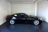 USED 2011 61 JAGUAR XK 5.0 V8 Coupe 2dr Petrol Auto Euro 5 (385 ps)-XK E-Type 50th Anniversary Edition (2011)-Commissioned by Jaguar Italy, the Italian dealer of Jaguar Cars, the XK E-Type Anniversary Edition was a limited production variant of the XK built to commemorate the 50th anniversary of the E-Type. Unveiled in 2011, the car features special Black Cherry Colour along with a black bonnet and 19-inch Tamana heritage alloy wheels with red Jaguar badging. Other exterior features include chrome bits on the front grille, wing mirrors, air intakes and window surrounds. The interior featured unique upholstery in Ivory and Charcoal leather along with a special 
