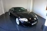 USED 2011 61 JAGUAR XK 5.0 V8 Coupe 2dr Petrol Auto Euro 5 (385 ps)-XK E-Type 50th Anniversary Edition (2011)-Commissioned by Jaguar Italy, the Italian dealer of Jaguar Cars, the XK E-Type Anniversary Edition was a limited production variant of the XK built to commemorate the 50th anniversary of the E-Type. Unveiled in 2011, the car features special Black Cherry Colour along with a black bonnet and 19-inch Tamana heritage alloy wheels with red Jaguar badging. Other exterior features include chrome bits on the front grille, wing mirrors, air intakes and window surrounds. The interior featured unique upholstery in Ivory and Charcoal leather along with a special 
