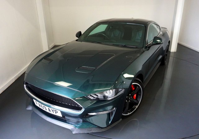 2019 69 Ford Mustang 5.0 V8 Bullitt Fastback 2dr Petrol Manual Euro 6 (459 ps)-2 Owners From New-Full Ford Service History-Finished In Highland Green Metallic.Fitted With DAB RADIO-AIRCON-PUSH BUTTON START-BLUETOOTH-SATNAV-REVERSE PARKING CAMERA-BLACK LEATHER RECARO SEATS-CRUISE CONTROL-ELECTRIC FOLDING MIRRORS-MFSW-6 SPEED MANUAL-BULLITT WHITE SPHERICAL GEAR SELECTOR-APPLE CAR PLAY & 19 INCH BULLITT DESIGN 5 SPOKE ALLOY WHEELS IN BLACK WITH RED BRAKE CALIPERS.