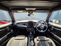 USED 2022 22 MINI CONVERTIBLE 1.5 Cooper Sport Convertible 2dr Petrol Manual Euro 6 (s/s) (136 ps) Climate control A/C, John Cooper Works Sports Pack, Apple Carplay, Android Auto, JCW Gloss Black 17" Alloys, Satellite navigation, Cruise control, Bluetooth connectivity for calls and music, Voice control, USB input, Keyless entry, Keyless drive, MINI Drive modes, DAB radio, Ambient lighting, LED daytime running lights, Rear parking sensors with digital display, Xenon headlights, Auto Wipers.
