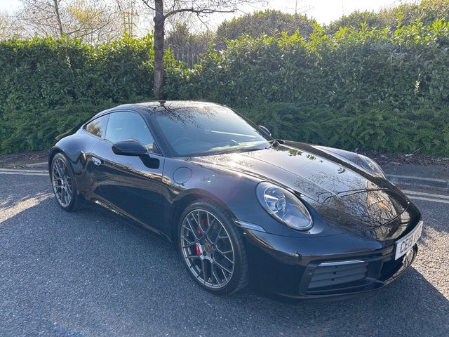 2019 19 Porsche 911 3.0T 992 Carrera 4S Coupe 2dr Petrol PDK 4WD Euro 6 (s/s) (450 ps)-1 Owner From New-Low Mileage-Finished In Jet Black Metallic-Heated Black Leather Upholstery-Bose Surround Sound-Privacy Glass-Slide & Tilt Glass Sunroof-Adaptive Cruise Control-Sports Chrono Package-Sports Exhaust System in Black-Wheel Centre Set With Full-Colour Porsche Crest-Heated GT Sports Steering Wheel in Leather-Porsche Crest on Headrests-20 / 21-inch RS Spyder Design Wheels-Electric Folding Exterior Mirrors-LED Matrix Main Headlights Including Porsche Dynamic Light System Plus (PDLS Plus)-ParkAssist Including Reversing Camera-4-Way Electric Sports Plus Seats-Porsche Logo in Black (high-gloss)-Garaged From New-Perfect Colour/Interior Combination-Great Specification-The One To Have.