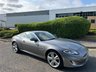 USED 2012 62 JAGUAR XK 5.0 V8 Portfolio Coupe 2dr Petrol Auto Euro 5 (385 ps)-2 Former Keepers-Finished In Lunar Grey Metallic-Heated Ivory Leather Upholstery-Dab Radio-Bluetooth-Mfsw-Satnav-Dual Climate Control-Cruise Control-10 Services On File-What a Car. 