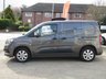 USED 2021 71 VAUXHALL COMBO 1.5 Turbo D 2000 Griffin Panel Van 4dr Diesel Manual L1 H1 Euro 6 (100 ps) Finished in MOONSTONE GREY MET with PLYLINED REAR. Very Clean 3 seater van. This practical small van has a one-tonne payload and the cabin is airy, comfortable and modern. Features include Fixed full height Bulk Head, Alloy Wheels, Rear Park Sensors, DAB Radio, Apple Play, B/Tooth, Cruise Control and more. Just Serviced.