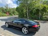 USED 2013 63 JAGUAR XK 5.0 V8 Portfolio Coupe 2dr Petrol Auto Euro 5 (385 ps)-Superb Low Mileage Example-Finished In Ultimate Black Metallic-Heated Ebony Leather Upholstery-Dual Climate Control-Mfsw-Cruise Control-Bluetooth-Satnav-Bowers & Wilkins Sound-Electric Front Memory Seats-Unmarked 20