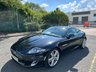 USED 2013 63 JAGUAR XK 5.0 V8 Portfolio Coupe 2dr Petrol Auto Euro 5 (385 ps)-Superb Low Mileage Example-Finished In Ultimate Black Metallic-Heated Ebony Leather Upholstery-Dual Climate Control-Mfsw-Cruise Control-Bluetooth-Satnav-Bowers & Wilkins Sound-Electric Front Memory Seats-Unmarked 20