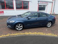 USED 2019 FORD MONDEO 2.0 TiVCT Titanium Edition Saloon 4dr Petrol Hybrid CVT 6Spd Euro 6 (s/s) (187 ps) NOW FOR SOMETHING A LITTLE DIFFERENT+FINISHED IN LOVELY METALLIC BLUE PAINT+PETROL HYBRID+ONLY 1 PREVIOUS OWNER+FULL LEATHER INTERIOR+SATELLITE NAVIGATION+PARK ASSIST+CLIMATE CONTROL+ALLOY WHEELS+COST NEW &pound;26695 MAKING THIS USED VEHICLE OUTSTANDING VALUE AT OUR LOW PRICE+1 FULL YEARS MOT PRIOR TO COLLECTION+CALL NOW TO SPEAK WITH OUR EXPERIENCED SALES TEAM AND ARRANGE A VIEWING+DONT MISS OUT, THIS WONT HANG AROUND FOR LONG!!!!!!!!!!!!!!!!!!!!!!!!!!!!!!!!!!!!