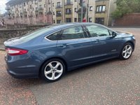 USED 2019 FORD MONDEO 2.0 TiVCT Titanium Edition Saloon 4dr Petrol Hybrid CVT 6Spd Euro 6 (s/s) (187 ps) NOW FOR SOMETHING A LITTLE DIFFERENT+FINISHED IN LOVELY METALLIC BLUE PAINT+PETROL HYBRID+ONLY 1 PREVIOUS OWNER+FULL LEATHER INTERIOR+SATELLITE NAVIGATION+PARK ASSIST+CLIMATE CONTROL+ALLOY WHEELS+COST NEW &pound;26695 MAKING THIS USED VEHICLE OUTSTANDING VALUE AT OUR LOW PRICE+1 FULL YEARS MOT PRIOR TO COLLECTION+CALL NOW TO SPEAK WITH OUR EXPERIENCED SALES TEAM AND ARRANGE A VIEWING+DONT MISS OUT, THIS WONT HANG AROUND FOR LONG!!!!!!!!!!!!!!!!!!!!!!!!!!!!!!!!!!!!