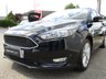 USED 2015 15 FORD FOCUS 1.0T EcoBoost Zetec Hatchback 5dr Petrol Manual Euro 6 (s/s) (100 ps) Finished in PANTHER BLACK METALLIC with GREY Cloth Trim. This is a modern day peoples car. With Zero Road Tax and 74.3 average MPG It is a economical, reliable, practical and affordable vehicle that is liked by everyone. Great features which include &pound;20 Road Tax, B/Tooth, DAB radio, Park Sensors, Heated Front Screen, Alloys, A/C, Front Fogs and much more. Just Serviced on arrival. 12 Months MOT.
