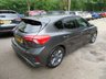 USED 2020 20 FORD FOCUS 1.0T EcoBoost ST-Line Hatchback 5dr Petrol Automatic Euro 6 (s/s) (125 ps) This automatic example looks great in Ford's Magnetic Grey option and benefits from Ford main dealer service history and comes supplied with a fresh service and inspection upon arrival to us. MOT until July 2026 (no advisories).