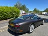 USED 2006 06 JAGUAR XKR 4.2 S Coupe 2dr Petrol Automatic (304 g/km, 400 bhp)-Rare Limited Edition XKR-S-Fantastic Low Mileage Example-2 Former Keepers-Last Keeper Since Aug 2011-Last Of The X100-White Badge-Finished In Copper Black Metallic-Heated Ivory Leather Upholstery-Recaro Sports Seats-Climate Control-20 Inch Split Rim Alloy Wheels-18 Services On File-Supplied New By Stratstone Jaguar Slough-Beautiful Example.The final run-out model was the S, which was available in four new colours in addition to the ones already on offer: Copper Black Metallic, Frost Blue Metallic, Bay Blue Metallic and Satin Silver Metallic. A revised white Jaguar Growler badge on the bonnet now featured chequered accents on either side. 